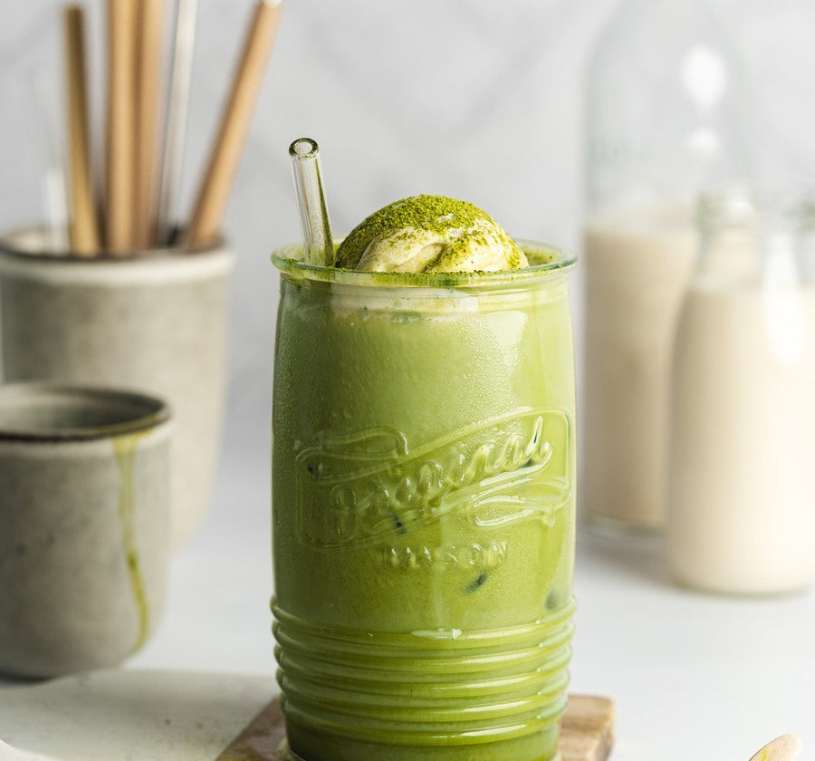 Whisked  organic matcha tea in a cup – natural energy boost and focus-enhancing superfood.