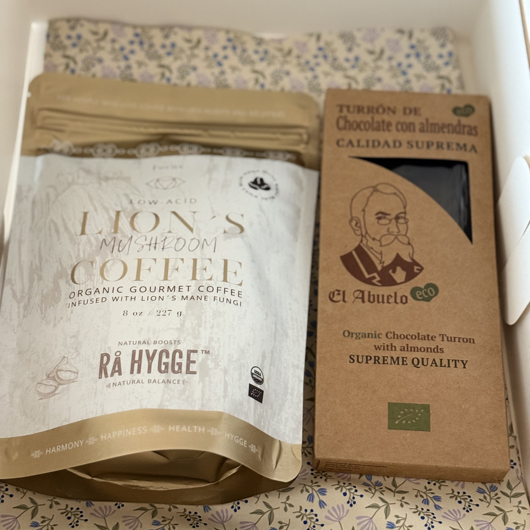 A package of Lion's Mane coffee and  El Abuelo organic chocolate turron premium and certified organic gift collection.